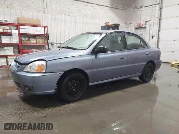 ✅ 2003 Kia Rio • VIN: KNADC125536274171 • Lot: 41986369. Wystawiony na IAAI z przebiegiem 59 837 mil. Bezpłatny archiwum sprzedaży aukcyjnych z USA i szczegółowy raport historii pojazdu na DreamBid. Zdjęcie 2.