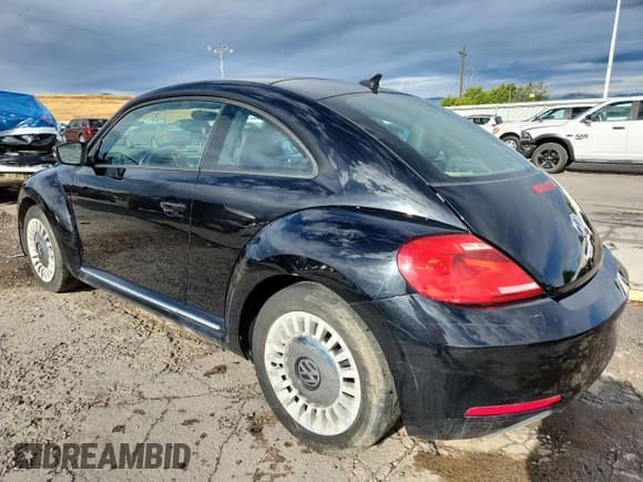✅ 2014 Volkswagen Beetle 1.8T • VIN: 3VWJ07AT8EM660665 • Lot: 80188155. Listed on Copart with 163,144 mi. Free auction sales archive from the USA and detailed vehicle history report at DreamBid. Image 2.