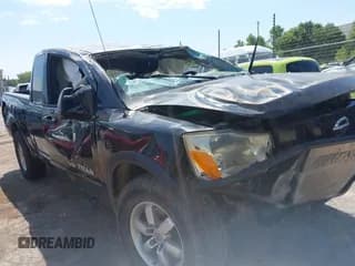 ✅ 2010 Nissan Titan SE • VIN: 1N6AA0CCXAN323318 • Lot: 42942861. Listed on IAAI with 143,169 mi. Free auction sales archive from the USA and detailed vehicle history report at DreamBid. Image 1.