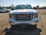 ✅ 2018 GMC Sierra 1500 SLT • VIN: 3GTU2NEC5JG571931 • Лот: 70195255. Опубликован ранее на Copart с пробегом 94 194 миль. Бесплатный доступ к архиву аукционных продаж из США и подробный отчёт об истории автомобиля на DreamBid. Изображение 5.