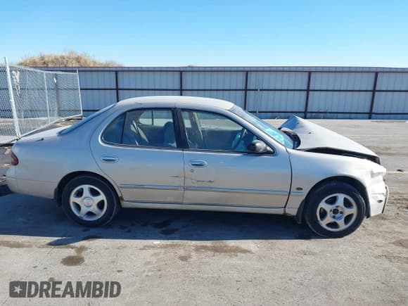 ✅ 1997 Nissan Altima XE • VIN: 1N4BU31D4VC221788 • Лот: 41356945. Опубликован ранее на IAAI с пробегом 136 931 миль. Бесплатный доступ к архиву аукционных продаж из США и подробный отчёт об истории автомобиля на DreamBid. Изображение 13.