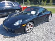 ✅ 2008 Porsche Cayman • VIN: WP0AA29858U760757 • Lot: 43203958. Listed on IAAI with 153,015 mi. Free auction sales archive from the USA and detailed vehicle history report at DreamBid. Image 6.