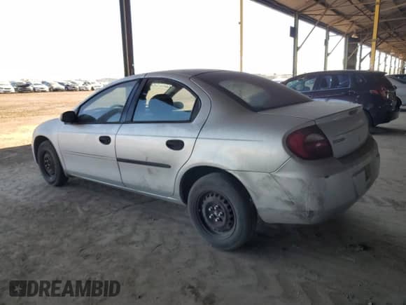 2005 Dodge Neon SE z VIN 1B3ES26C65D158616, wystawiony jako Copart lot #90566665 z przebiegiem 296 496 mil mil oraz Czysty tytuł • Clean title. Historia ofert i sprzedaży dostępna na DreamBid. Obrazek 2.