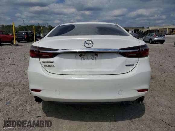 ✅ 2021 Mazda 6 Touring • VIN: JM1GL1VM3M1615598 • Лот: 70013505. Опубликован ранее на Copart с пробегом 51 640 миль. Бесплатный доступ к архиву аукционных продаж из США и подробный отчёт об истории автомобиля на DreamBid. Изображение 6.
