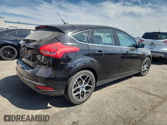 ✅ 2018 Ford Focus SEL • VIN: 1FADP3M23JL303872 • Lot: 70679895. Wystawiony na Copart z przebiegiem 61 568 mil. Bezpłatny archiwum sprzedaży aukcyjnych z USA i szczegółowy raport historii pojazdu na DreamBid. Zdjęcie 3.