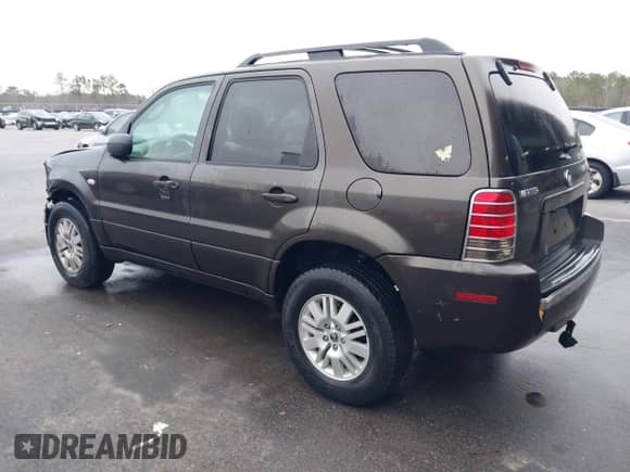 2005 Mercury Mariner Luxury z VIN 4M2YU56195DJ14917, wystawiony jako IAAI lot #41538962 z przebiegiem 210 486 mil mil oraz . Historia ofert i sprzedaży dostępna na DreamBid. Obrazek 3.