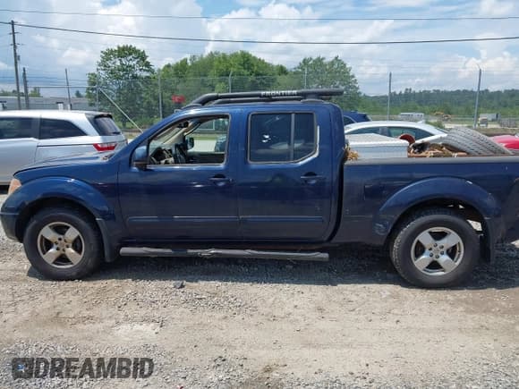 ✅ 2007 Nissan Frontier SE • VIN: 1N6AD09W87C404587 • Lot: 42896988. Listed on IAAI with 113,900 mi. Free auction sales archive from the USA and detailed vehicle history report at DreamBid. Image 14.