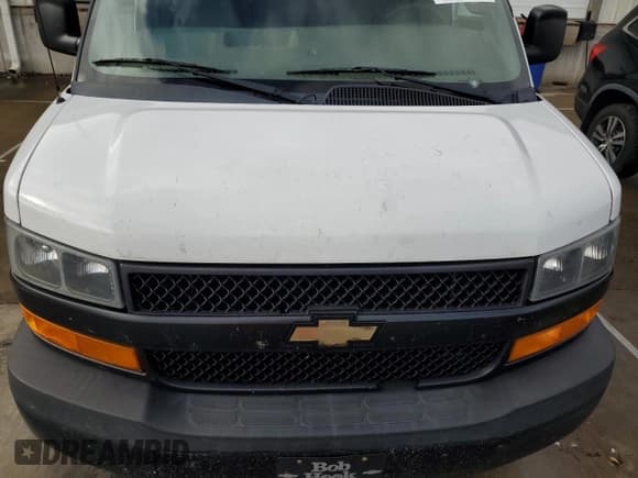 ✅ 2018 Chevrolet Express Cargo • VIN: 1GCWGBFP1J1340565 • Lot: 82257055. Listed on Copart with 228,369 mi. Free auction sales archive from the USA and detailed vehicle history report at DreamBid. Image 12.