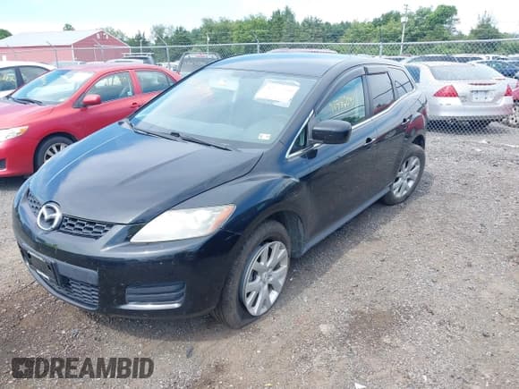 ✅ 2009 Mazda CX-7 Sport • VIN: JM3ER29L190217033 • Lot: 42777594. Listed on IAAI with 158,434 mi. Free auction sales archive from the USA and detailed vehicle history report at DreamBid. Image 16.
