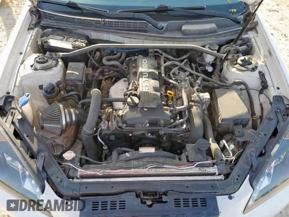 ✅ 2012 Hyundai Genesis Coupe 2.0T • VIN: KMHHT6KD2CU068984 • Лот: 61478935. Опубликован ранее на Copart с пробегом 104 911 миль. Бесплатный доступ к архиву аукционных продаж из США и подробный отчёт об истории автомобиля на DreamBid. Изображение 11.