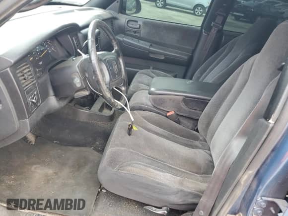 2002 Dodge Dakota Sport z VIN 1B7HG38N22S696268, wystawiony jako Copart lot #78382174 z przebiegiem 239 879 mil mil oraz Szkoda całkowita • Salvage title. Historia ofert i sprzedaży dostępna na DreamBid. Obrazek 7.