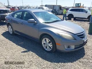 ✅ 2010 Mazda 6 i Touring • VIN: 1YVHZ8CH0A5M50075 • Lot: 42714782. Listed on IAAI with 162,344 mi. Free auction sales archive from the USA and detailed vehicle history report at DreamBid. Image 1.