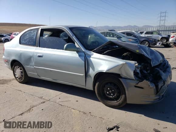 2005 Hyundai Accent GLS z VIN KMHCG35C55U337255, wystawiony jako Copart lot #43761985 z przebiegiem 192 585 mil mil oraz Szkoda całkowita • Salvage title. Historia ofert i sprzedaży dostępna na DreamBid. Obrazek 4.