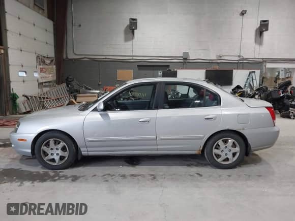 2006 Hyundai Elantra GLS with VIN KMHDN46D26U293787, listed as a IAAI auction lot 43489111 with 247,390 mi miles and . Bid and sale history available at DreamBid. Image 14.