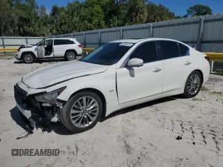 ✅ 2020 Infiniti Q50 Luxe • VIN: JN1EV7AP0LM205023 • Lot: 82580325. Listed on Copart with 96,883 mi. Free auction sales archive from the USA and detailed vehicle history report at DreamBid. Image 1.