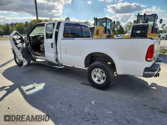 ✅ 2002 Ford F-350 XL • VIN: 1FTSW31F92EA63776 • Lot: 81962245. Listed on Copart with 242,572 mi. Free auction sales archive from the USA and detailed vehicle history report at DreamBid. Image 2.