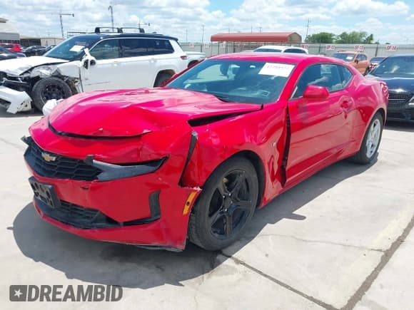 ✅ 2022 Chevrolet Camaro 1LT • VIN: 1G1FB1RX9N0112791 • Lot: 42204932. Listed on IAAI with 69,679 mi. Free auction sales archive from the USA and detailed vehicle history report at DreamBid. Image 2.