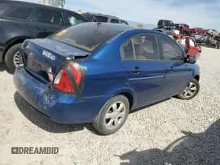 2006 Hyundai Accent GLS with VIN KMHCN46C46U046175, listed as a Copart auction lot 71629864 with 150,089 mi miles and Salvage title. Bid and sale history available at DreamBid. Image 3.