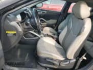 ✅ 2014 Hyundai Veloster • VIN: KMHTC6AD2EU208806 • Lot: 71159544. Wystawiony na Copart z przebiegiem 154 204 mil. Bezpłatny archiwum sprzedaży aukcyjnych z USA i szczegółowy raport historii pojazdu na DreamBid. Zdjęcie 7.