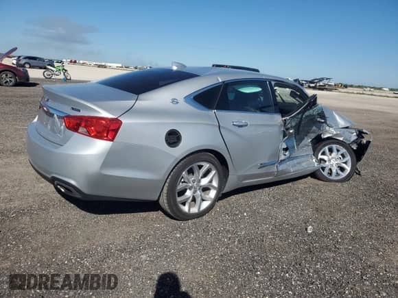 2018 Chevrolet Impala Premier z VIN 2G1125S37J9117190, wystawiony jako Copart lot #86643895 z przebiegiem Nie podano mil oraz Nie do naprawy • Non repairable. Historia ofert i sprzedaży dostępna na DreamBid. Obrazek 3.