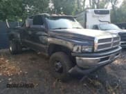 ✅ 2002 Dodge 3500 • VIN: 3B7MF336X2M274565 • Lot: 65164585. Listed on Copart with 178,744 mi. Free auction sales archive from the USA and detailed vehicle history report at DreamBid. Image 4.