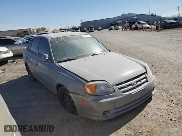 2003 Hyundai Accent GL с VIN KMHCG45C13U455449, выставлен на аукционе Copart как лот 42625285 с пробегом Не указан миль и Списание • Salvage title. История ставок и продаж доступна на DreamBid. Изображение 4.