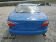 ✅ 1998 Jaguar XK • VIN: SAJJGAED3AR025857 • Lot: 84219455. Listed on Copart with Not provided. Free auction sales archive from the USA and detailed vehicle history report at DreamBid. Image 6.