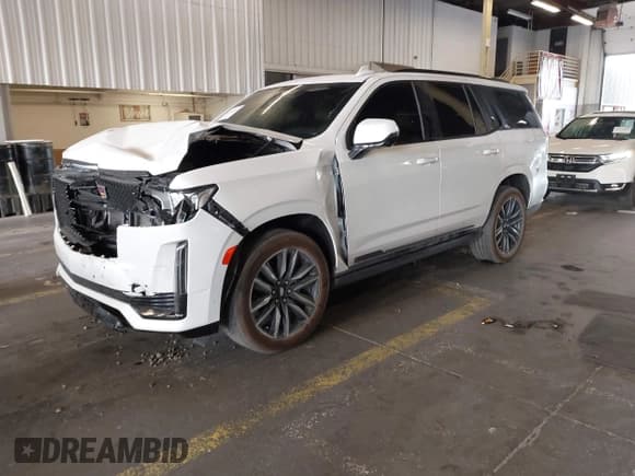 ✅ 2023 Cadillac Escalade 4WD Sport • VIN: 1GYS4FKL4PR278892 • Лот: 43241713. Опубликован ранее на IAAI с пробегом 25 091 миль. Бесплатный доступ к архиву аукционных продаж из США и подробный отчёт об истории автомобиля на DreamBid. Изображение 2.