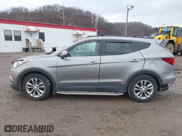✅ 2018 Hyundai Santa Fe Limited • VIN: 5XYZUDLA3JG536959 • Лот: 41648966. Опубликован ранее на IAAI с пробегом 72 563 миль. Бесплатный доступ к архиву аукционных продаж из США и подробный отчёт об истории автомобиля на DreamBid. Изображение 15.