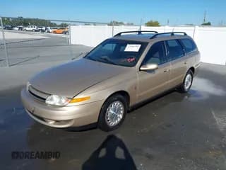 ✅ 2001 Saturn LW • VIN: 1G8JW82R81Y560777 • Лот: 43484705. Опубликован ранее на IAAI с пробегом 100 746 миль. Бесплатный доступ к архиву аукционных продаж из США и подробный отчёт об истории автомобиля на DreamBid. Изображение 2.