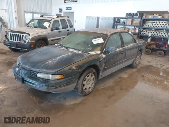 ✅ 1995 Eagle Vision • VIN: 2E3HD66FXSH535089 • Lot: 41620914. Wystawiony na IAAI z przebiegiem 162 078 mil. Bezpłatny archiwum sprzedaży aukcyjnych z USA i szczegółowy raport historii pojazdu na DreamBid. Zdjęcie 2.