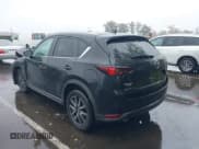 ✅ 2018 Mazda CX-5 Touring • VIN: JM3KFBCM3J0437436 • Lot: 43436406. Wystawiony na IAAI z przebiegiem 122 774 mil. Bezpłatny archiwum sprzedaży aukcyjnych z USA i szczegółowy raport historii pojazdu na DreamBid. Zdjęcie 3.