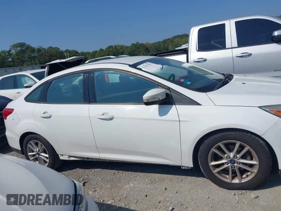 ✅ 2016 Ford Focus SE • VIN: 1FADP3F23GL320287 • Lot: 43257092. Listed on IAAI with 97,945 mi. Free auction sales archive from the USA and detailed vehicle history report at DreamBid. Image 13.