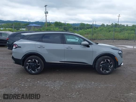 ✅ 2023 Kia Sportage SX-Prestige • VIN: 5XYK5CAF8PG134645 • Лот: 42671767. Опубликован ранее на IAAI с пробегом 15 028 миль. Бесплатный доступ к архиву аукционных продаж из США и подробный отчёт об истории автомобиля на DreamBid. Изображение 13.