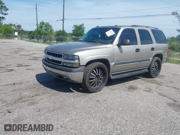 ✅ 2003 Chevrolet Tahoe LT • VIN: 1GNEC13Z13R236967 • Lot: 42541249. Wystawiony na IAAI z przebiegiem 305 448 mil. Bezpłatny archiwum sprzedaży aukcyjnych z USA i szczegółowy raport historii pojazdu na DreamBid. Zdjęcie 2.