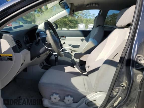 2007 Hyundai Accent GLS z VIN KMHCN46C57U103209, wystawiony jako Copart lot #74140414 z przebiegiem 191 880 mil mil oraz Szkoda całkowita • Salvage title. Historia ofert i sprzedaży dostępna na DreamBid. Obrazek 7.