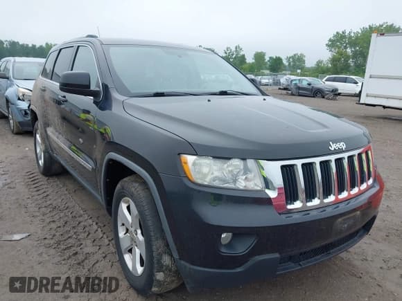 ✅ 2011 Jeep Grand Cherokee Laredo • VIN: 1J4RR4GG3BC505615 • Lot: 42455554. Listed on IAAI with 186,399 mi. Free auction sales archive from the USA and detailed vehicle history report at DreamBid. Image 1.