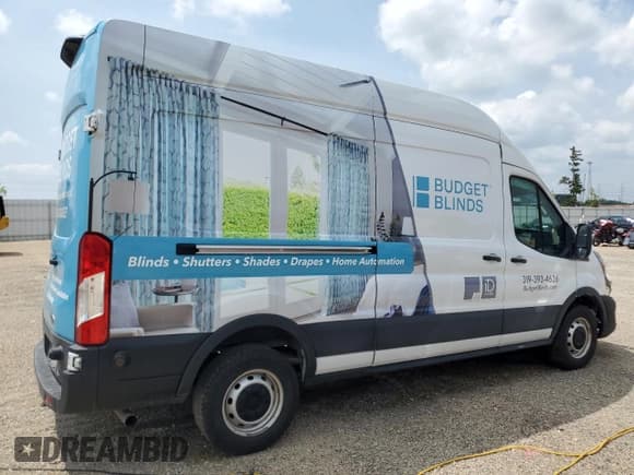 ✅ 2020 Ford Transit Cargo • VIN: 1FTBR1X87LKB58859 • Lot: 61063065. Listed on Copart with 111,747 mi. Free auction sales archive from the USA and detailed vehicle history report at DreamBid. Image 3.