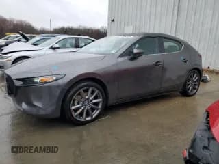 ✅ 2021 Mazda 3 Preferred • VIN: JM1BPBLL8M1338901 • Lot: 49445535. Listed on Copart with 65,893 mi. Free auction sales archive from the USA and detailed vehicle history report at DreamBid. Image 1.