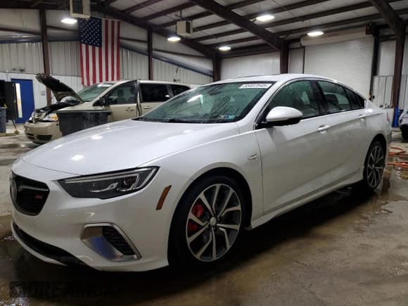 ✅ 2018 Buick Regal GS • VIN: W04GS6SSXJ1130903 • Lot: 55407545. Listed on Copart with 78,096 mi. Free auction sales archive from the USA and detailed vehicle history report at DreamBid. Image 1.