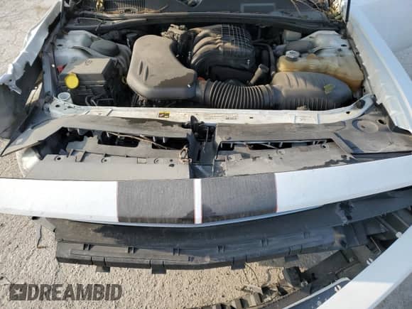 2013 Dodge Challenger SXT z VIN 2C3CDYAG8DH627871, wystawiony jako Copart lot #68657084 z przebiegiem Nie podano mil oraz Szkoda całkowita • Salvage title. Historia ofert i sprzedaży dostępna na DreamBid. Obrazek 13.