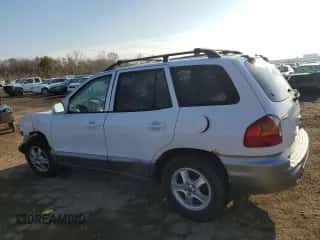 2001 Hyundai Santa Fe GLS с VIN KM8SC83D71U054852, выставлен на аукционе Copart как лот 78704454 с пробегом 100 591 миль миль и Списание • Salvage title. История ставок и продаж доступна на DreamBid. Изображение 2.