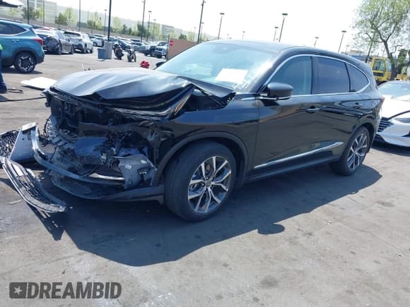 ✅ 2022 Acura MDX Technology • VIN: 5J8YD9H42NL002584 • Lot: 42052582. Listed on IAAI with 37,122 mi. Free auction sales archive from the USA and detailed vehicle history report at DreamBid. Image 2.