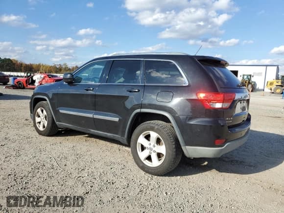 ✅ 2013 Jeep Grand Cherokee Laredo • VIN: 1C4RJFAG2DC543471 • Lot: 91461505. Listed on Copart with 188,784 mi. Free auction sales archive from the USA and detailed vehicle history report at DreamBid. Image 2.