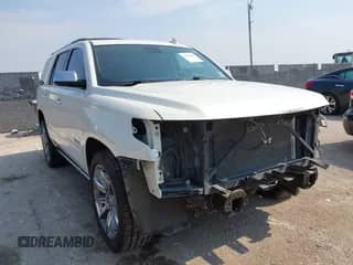 2015 Chevrolet Tahoe LTZ z VIN 1GNSCCKC0FR573307, wystawiony jako IAAI lot #43094498 z przebiegiem 170 852 mil mil oraz . Historia ofert i sprzedaży dostępna na DreamBid. Obrazek 1.