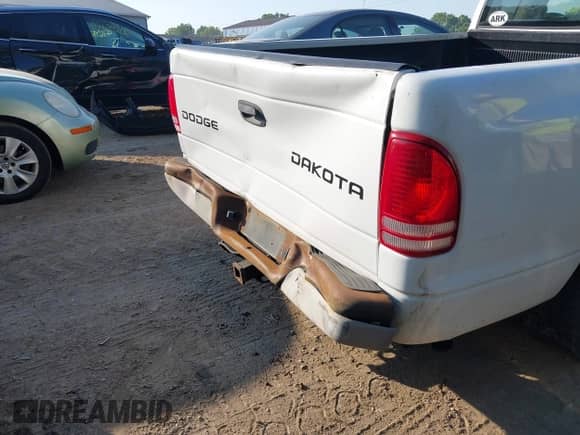 2004 Dodge Dakota Sport z VIN 1D7GL32K84S615322, wystawiony jako IAAI lot #42655462 z przebiegiem 187 209 mil mil oraz . Historia ofert i sprzedaży dostępna na DreamBid. Obrazek 13.