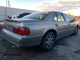 ✅ 2002 Cadillac Seville Touring STS • VIN: 1G6KY54922U243816 • Лот: 79229134. Опубликован ранее на Copart с пробегом 52 832 миль. Бесплатный доступ к архиву аукционных продаж из США и подробный отчёт об истории автомобиля на DreamBid. Изображение 3.