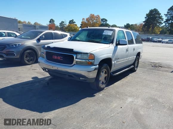 ✅ 2004 GMC Yukon XL SLT • VIN: 1GKEC16Z34J301925 • Lot: 43612027. Listed on IAAI with 217,749 mi. Free auction sales archive from the USA and detailed vehicle history report at DreamBid. Image 2.