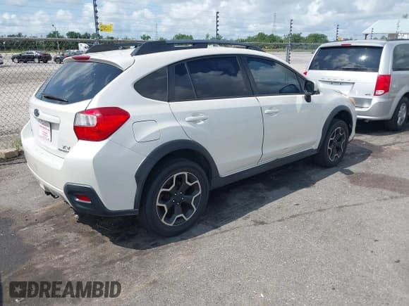 ✅ 2013 Subaru Crosstrek Premium • VIN: JF2GPACC5D1864307 • Lot: 42430058. Listed on IAAI with 221,583 mi. Free auction sales archive from the USA and detailed vehicle history report at DreamBid. Image 4.