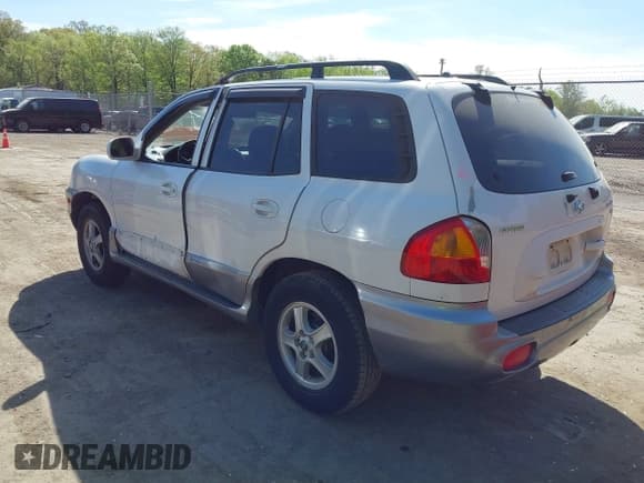 ✅ 2004 Hyundai Santa Fe GLS • VIN: KM8SC73DX4U840014 • Lot: 42085495. Listed on IAAI with 150,125 mi. Free auction sales archive from the USA and detailed vehicle history report at DreamBid. Image 3.